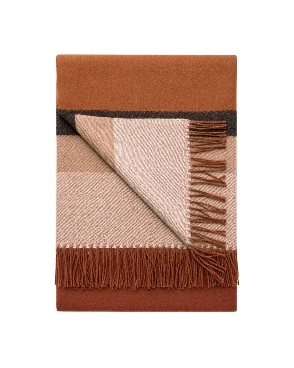 Russet baby alpaca throw folded, showing copper, blush and charcoal blocks with fringe